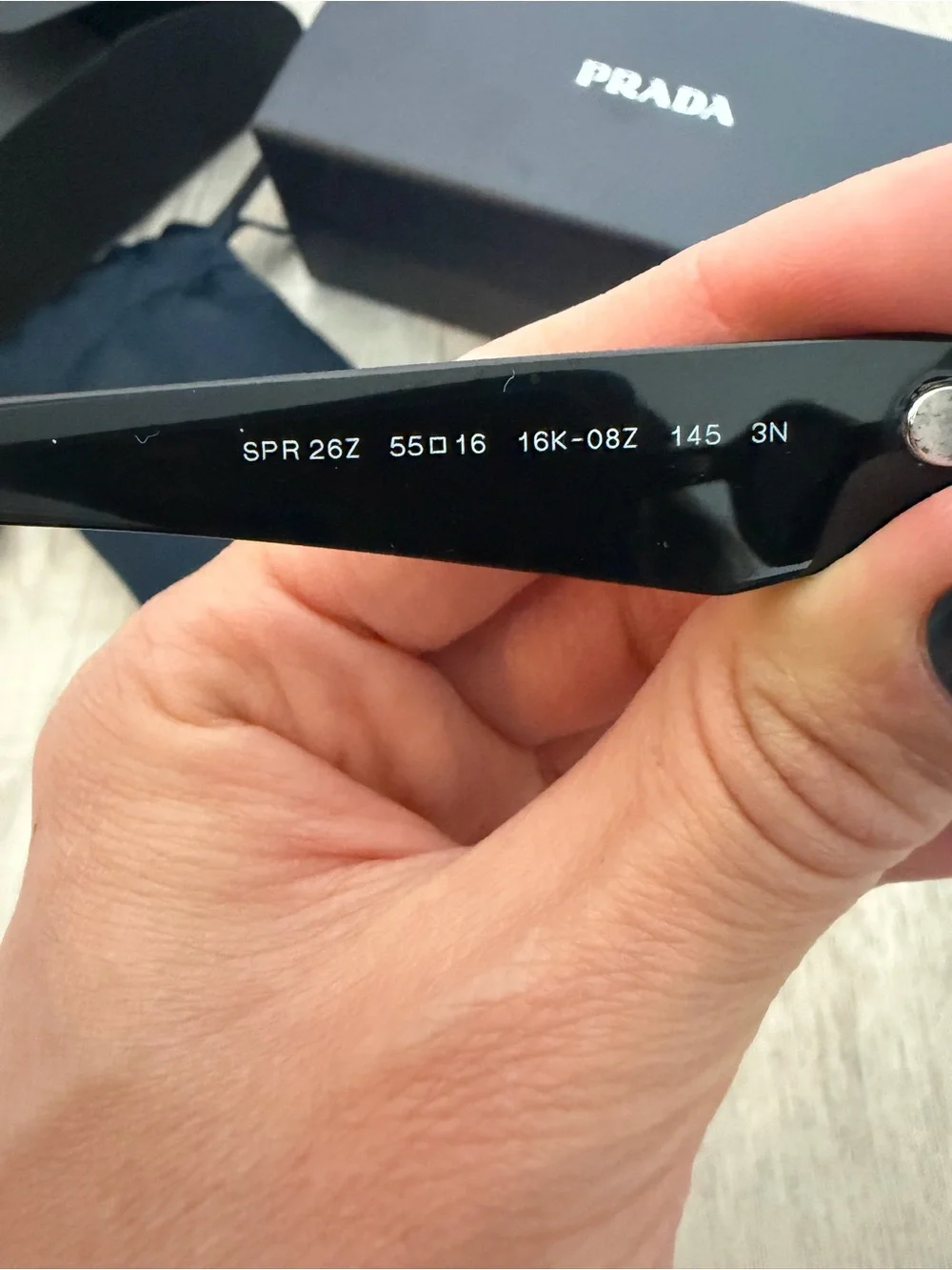 Prada Symbole Black Oval Sunglasses
